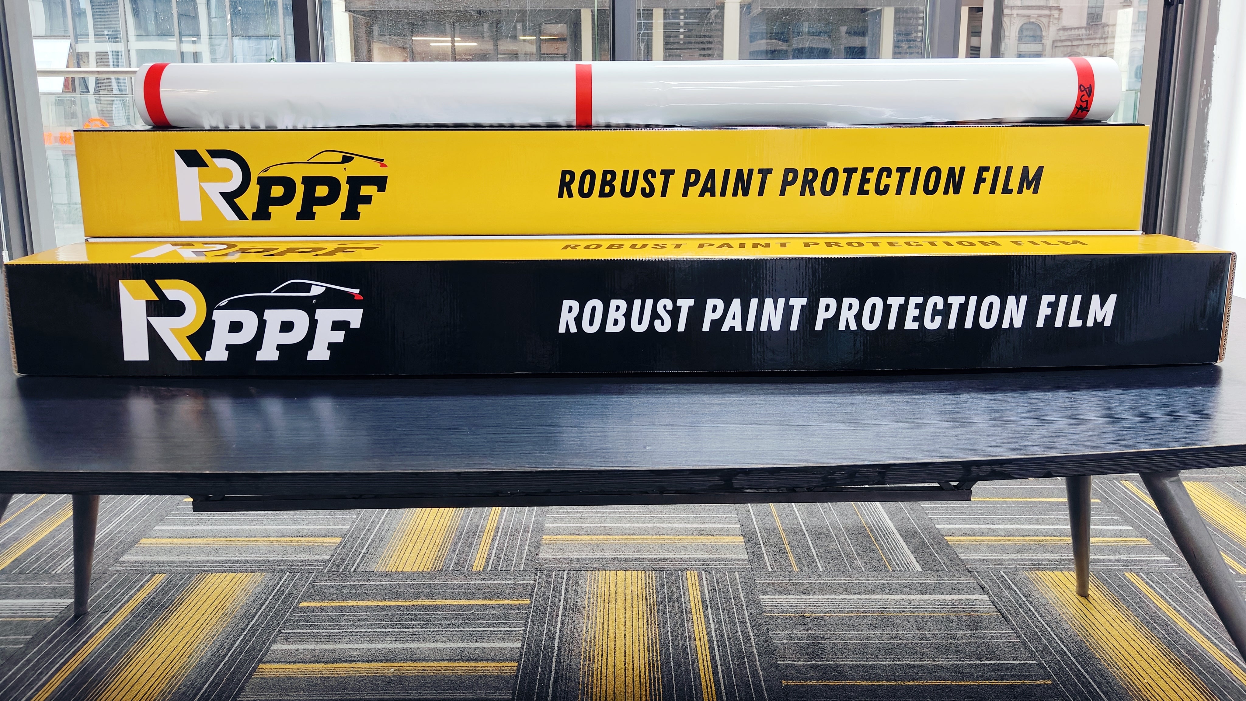 The Clear Bra paint surface protection film from RPPF, including the film and packaging.